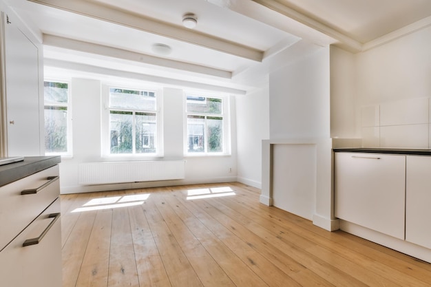 The interior of an elite room in daylight with a wooden floor