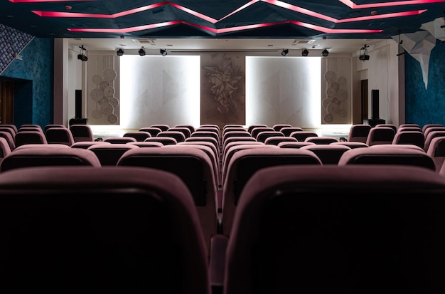 Interior of an empty concert hall with colored lighting