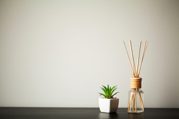 Interior items stand on a table in a bright room