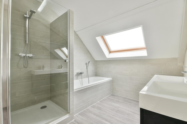 Interior of modern light bathroom with showerbox and sink