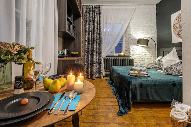 Interior of the modern luxure bedroom in studio apartments