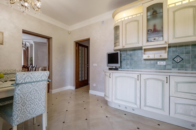 Interior of the modern luxure kitchen in studio apartments in minimalistic style