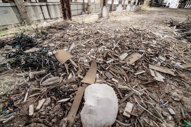 Interior of old factory buildings destroyed Ruins of industrial enterprise dark debris destroyed factory premises in factory Selective focus