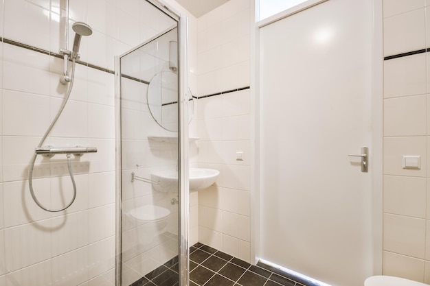 Interior of small bathroom with bathtub and toilet