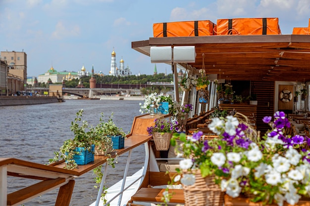 The interior of the urban river ship with a panoramic view of the urban landscape The concept of tourism recreation walking around the city rest in the city River transport