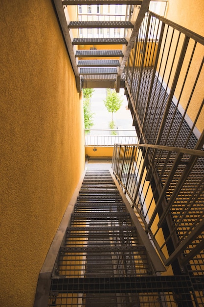 Internal metal fire escapes of a modern building modern metal ladder Fire escape in a modern house