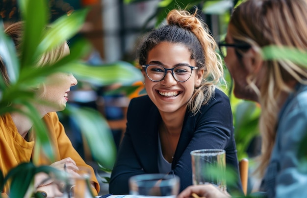 Photo in an international advertising company a team of happy employees smile during a planning meeting diversity collaboration and teamwork are all key elements of a healthy work environment