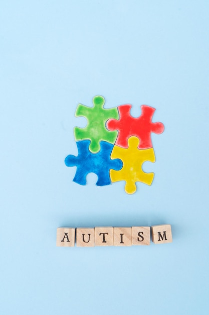 International autism awareness day word autisn and jigsaw puzzles