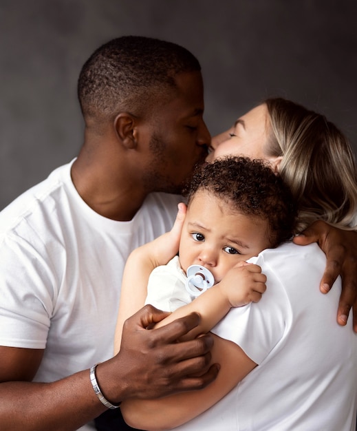 International family hugs each other