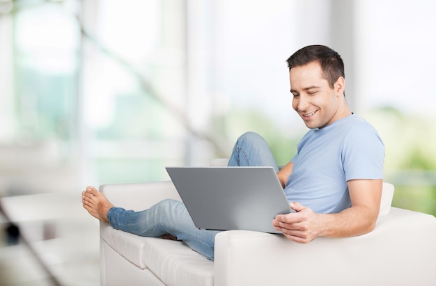 Internet business men home couch laptop handsome sofa