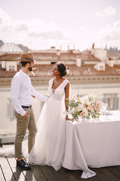 Interracial wedding couple. Destination fine-art wedding in Florence, Italy