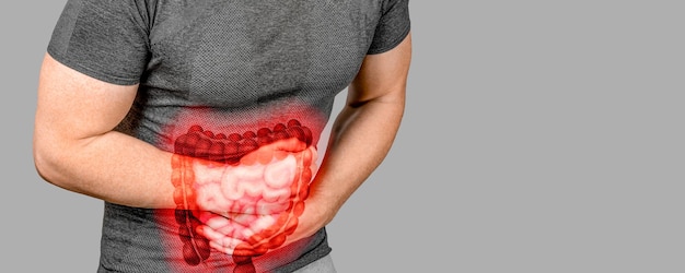 Intestinal inflammation highlighted intestines Irritable Bowel Syndrome Abdominal pain man Large intestine on man body stomachache diarrhea symptom or food poisoning copy space