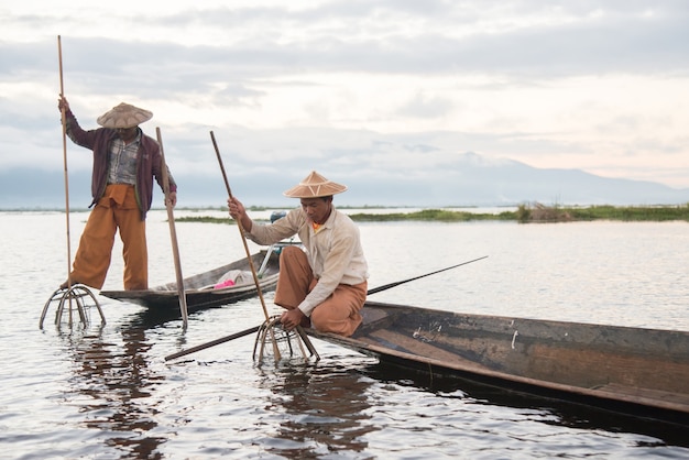 Intha fishermen working in the morning on Inle lake in Myanmar