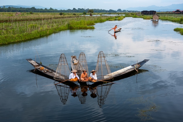 Intha fishermen working in the morning.