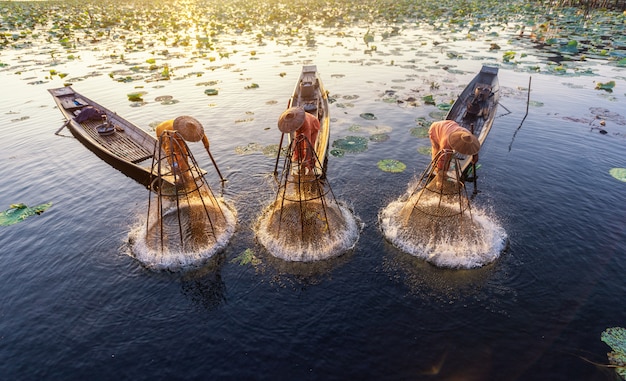 Intha fishermen working in the morning.