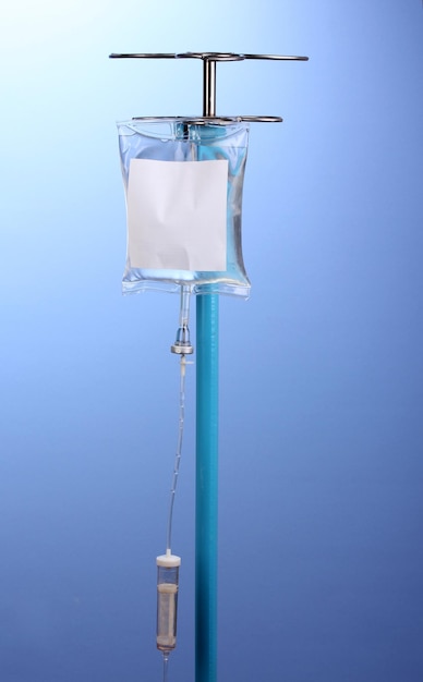 Intravenous therapy on blue background