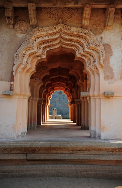 Intricate carvings on an arched hallway