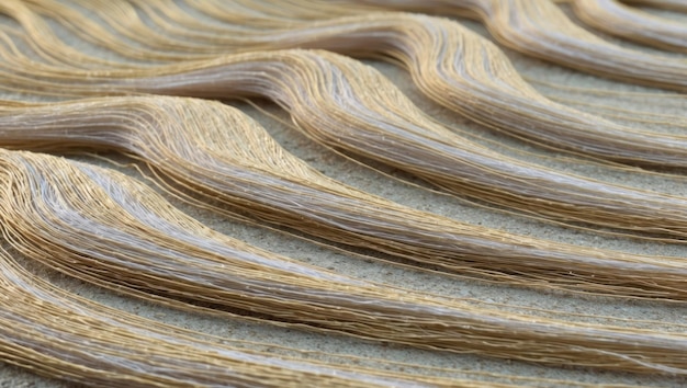 An intricate woven texture showcasing natural colors and flowing patterns