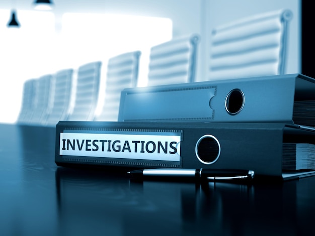 Investigations Concept on Blurred Background Investigations File Folder on Wooden Black Desktop 3D Render