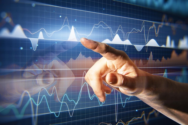 Investing and analyzing concept with man finger pointing on forex market indicators and graphs dynamics and changes on virtual screen with squared background