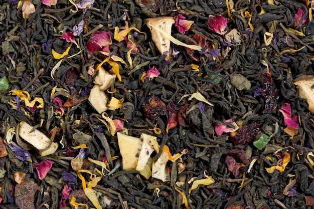 Invigorating Green Tea pineapple pieces slices of apple cherry strawberry marigold petals and roses