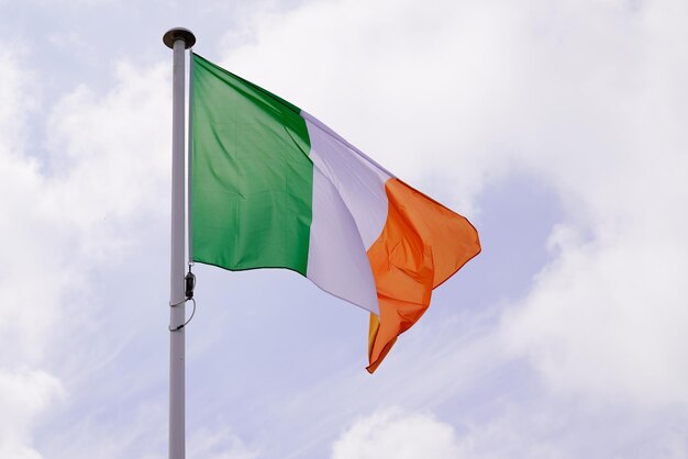 Ireland flag irish National state flag on wind mat with blue cloud sky