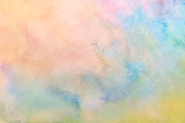 Iridescent blue pink yellow abstract watercolor decorative textured background.