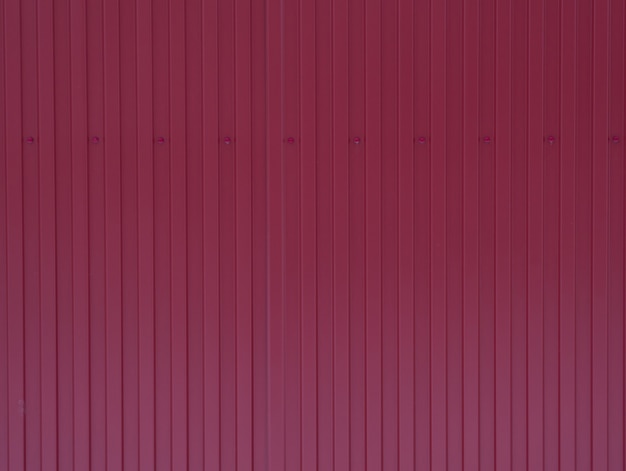 Iron background painted with burgundy red paint, texture with vertical lines, empty horizontal composition,background, background
