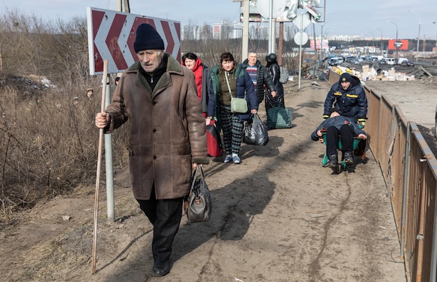 IRPIN UKRAINE Mar 09 2022 War in Ukraine Thousands of residents of Irpin have to abandon their homes and evacuate as russian troops are bombing a peaceful city War refugees in Ukraine