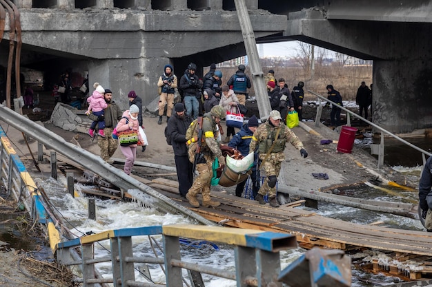 IRPIN UKRAINE Mar 09 2022 War in Ukraine Thousands of residents of Irpin have to abandon their homes and evacuate as russian troops are bombing a peaceful city War refugees in Ukraine