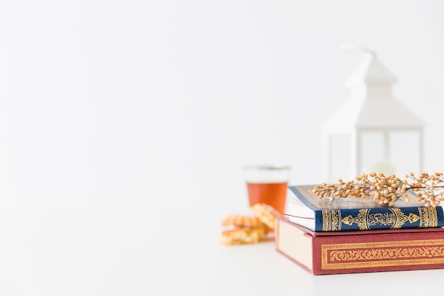 Islamic books with lantern and branch