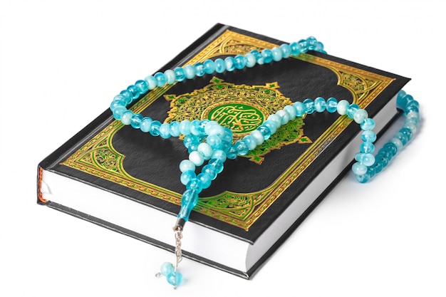 Islamic holy book and beads