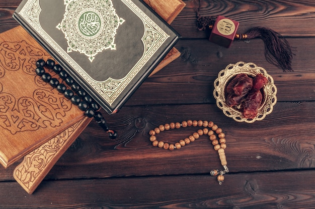 Islamic holy book on wooden table