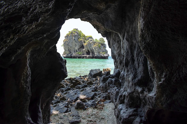 The island is in the sea from a view of the cave at koh Lankajiu , Chumphon , Thailand.