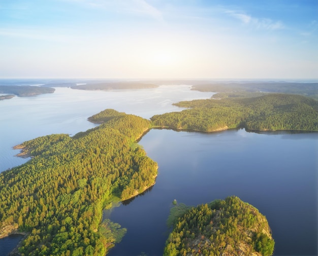 Island on lake during sunset aerial view