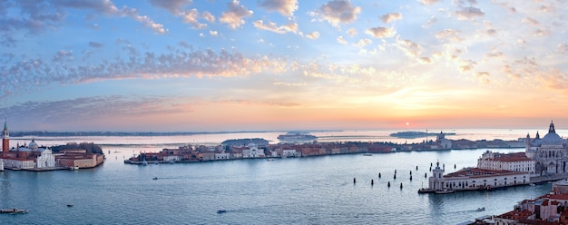 The Island of San Giorgio Maggiore. Venice city (Italy) picturesque sunset view. Seven shots panorama. All peoples unrecognizable