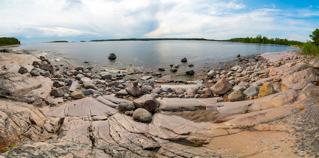 Islands in Lake Ladoga. Beautiful landscape - water, pines and boulders.