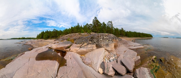 Islands in Lake Ladoga. Beautiful landscape - water, pines and boulders.