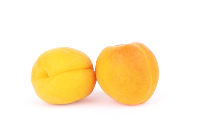 Isolated apricots Fresh whole apricot fruit with leaf