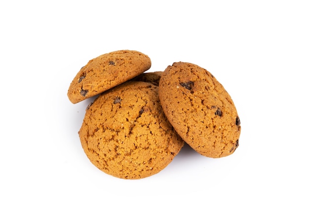 Isolated clipping path of die cut dark chocolate chip cookies piece set stack and crumbs on white background of closeup tasty bakery organic homemade American biscuit sweet dessert