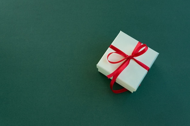 Isolated gift box on green background