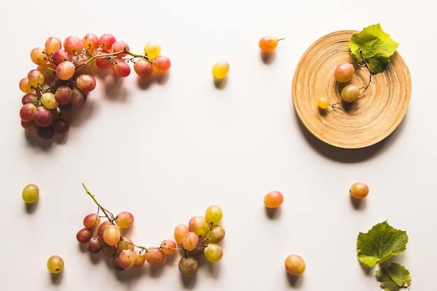 Isolated grapes. Red grape in a bowl isolated on white background