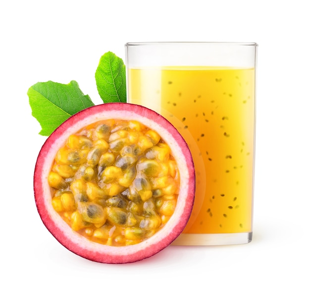 Isolated juice. Glass of passion fruit smoothie and one slice of fruit isolated on white surface with clipping path