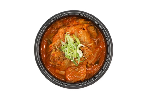 Photo isolated kimchi soup in the black stone bowl