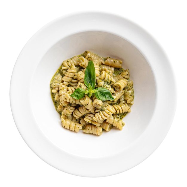 Isolated portion of pesto fusilli pasta