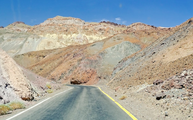 Isolated road among the rocks in Death Valley, California, USA