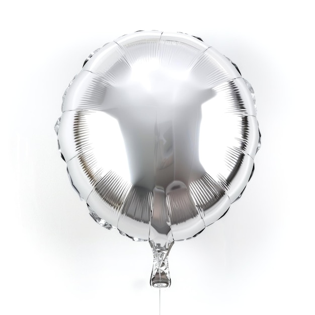 Photo an isolated shiny silver round balloon captures the light with its reflective surface