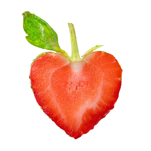 Isolated Sliced strawberries in a heart shape as a symbol of love