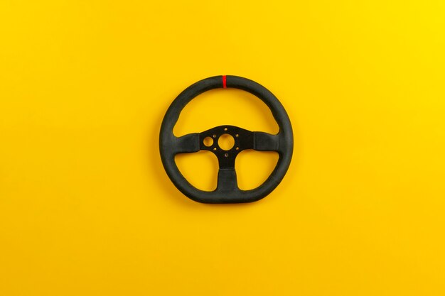 A isolated steering wheel a view from above, simple minimalist racing concept