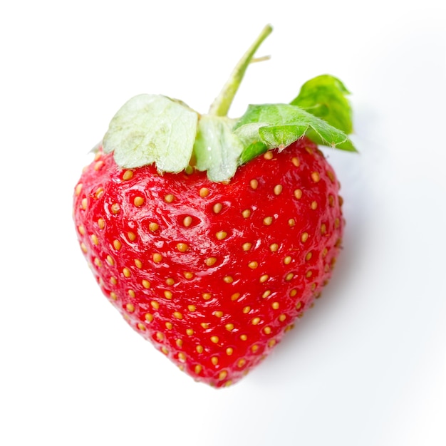 Isolated Strawberries in heart shape with leaves